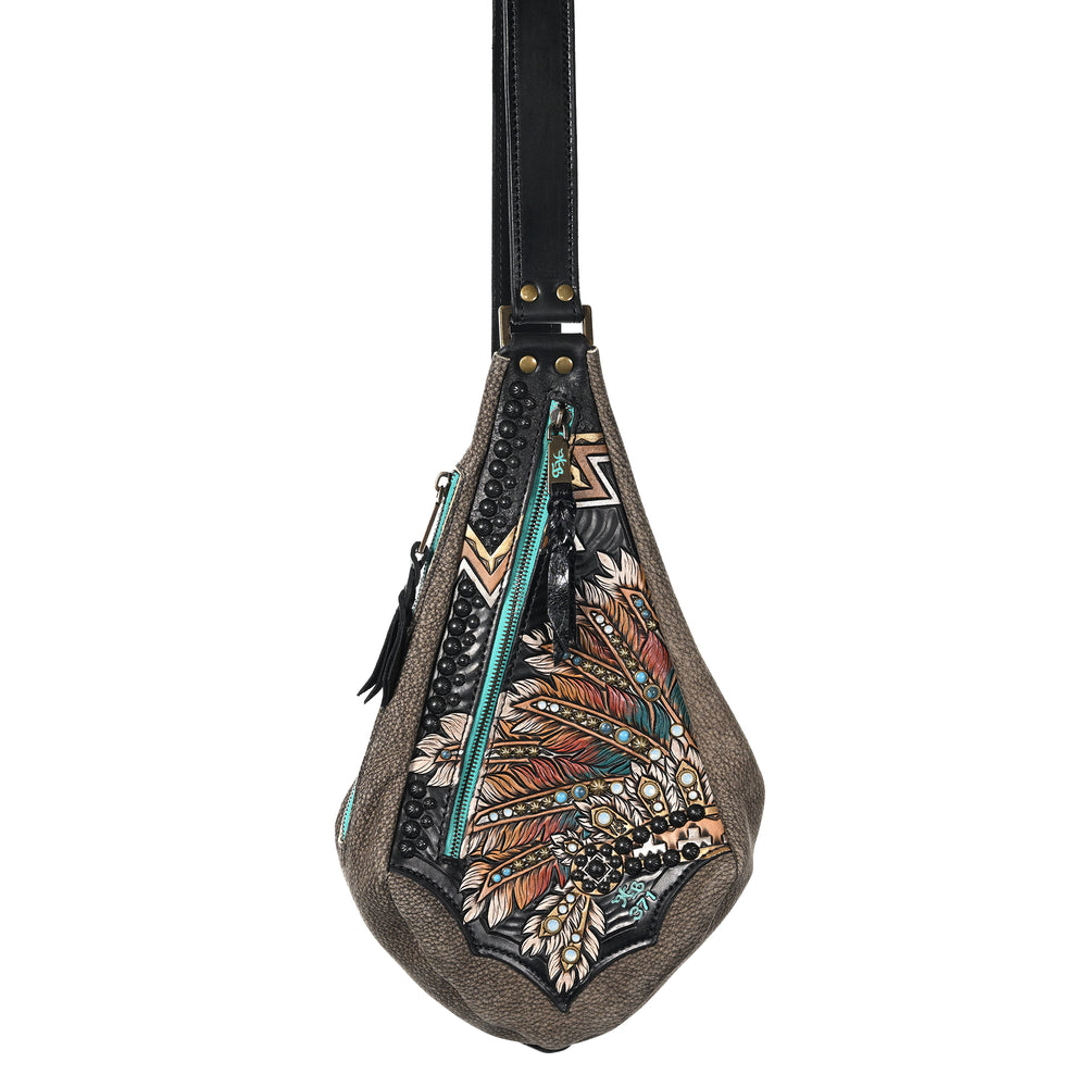 A patterned, teardrop-shaped fyra bag #371 with fringe detail and black strap by Heritage Brand.