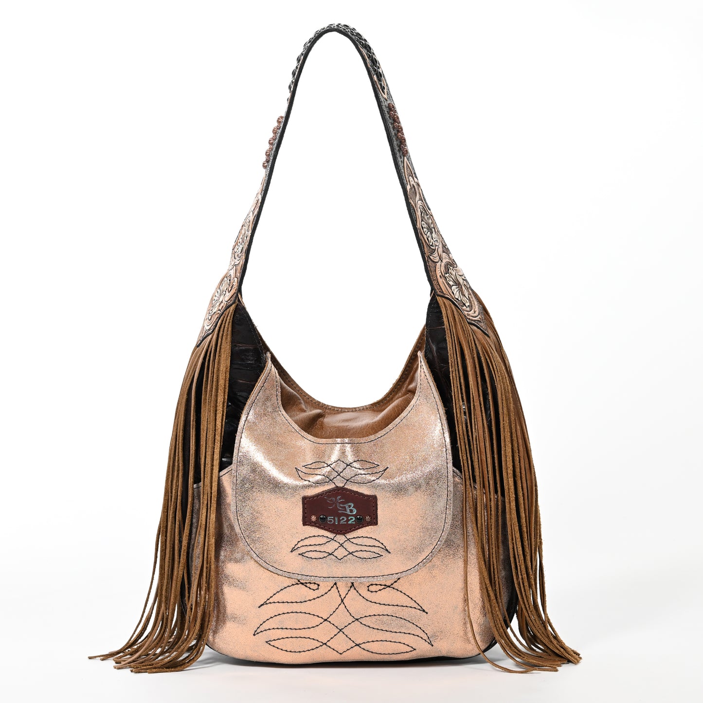 
                  
                    Heritage Brand's marilyn bag #5122, a bronze-colored fringed shoulder bag, is showcased on a white background.
                  
                