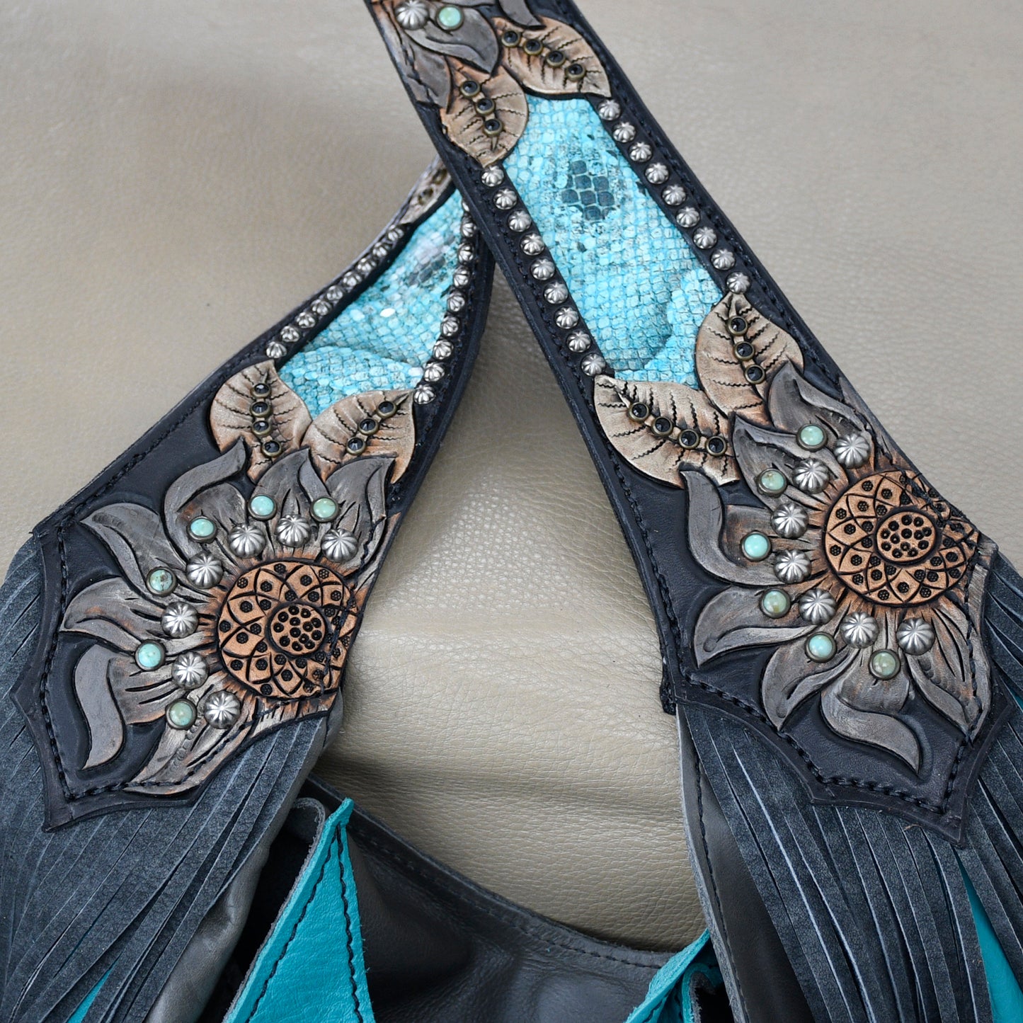 
                  
                    Close-up of a Heritage Brand Marilyn Bag #1205 with turquoise inlay and metallic embellishments.
                  
                