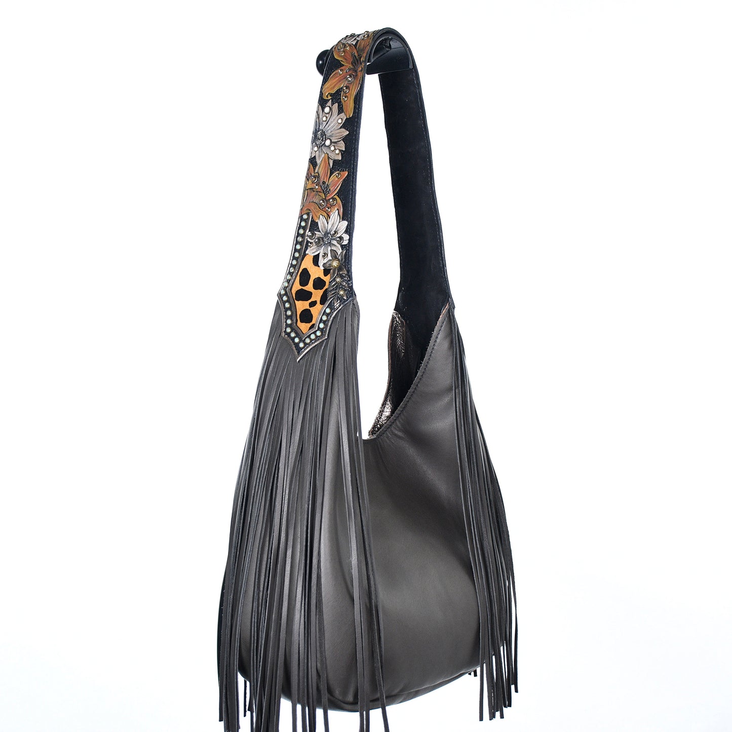 
                  
                    Heritage Brand marilyn bag #2834 with black leather fringe and decorative stitching on a white background.
                  
                